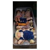Box Lot Of Assorted Dolls & A Plastic Storage