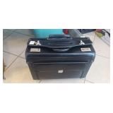 (1) Hard Sided Briefcase w/ Wheels, Handle & Two
