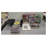 Assorted CDs, VHS Tapes & Metal Storage Box Assorted CDs, VHS Tapes & Metal Storage Box