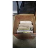 Box Of Assorted Cookbooks & Table Cloths