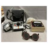 Vintage Polaroid Camera, Multimeter, Goggles
