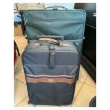 Pair Of Destinations Suitcases