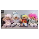 (4) Assorted Troll Dolls