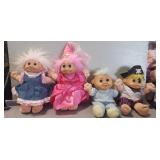 (4) Assorted Troll Dolls