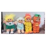 (4) Assorted Troll Dolls
