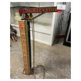 Vintage Wolverine Tin Skyscraper Elevator