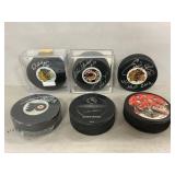Signed, Collectible Hockey Pucks Including Eddie