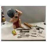 Plaster Atlas Statue, Flashlight, Tin Clicker,