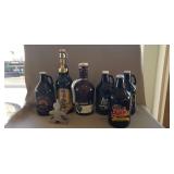 (6) Assorted Brown Glass Growlers & (1)
