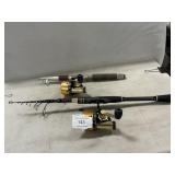 Pair Of Telescoping Fishing Rods With Daiwa Reels