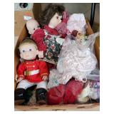 Box Lot Of Assorted Dolls, Doll Clothes & More