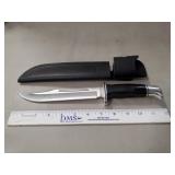 (1) Buck Knife w/ Leather Sheath