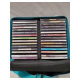 (30) Assorted CDs w/ Carrier (Includes Some