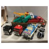Structo Dump Truck, B.O. Tow Truck & Asdt. Toy