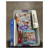 Storage Tote Full Of Puzzles