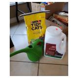 (1) Bag Of Cat Litter, Partial Container Of Ice
