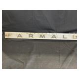 Two Mc Cormick Farmall Tractor Nameplates