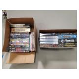 (2) Boxes Of Assorted DVDs