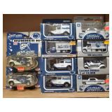(10) Assorted Penn State Collector Toy Trucks &