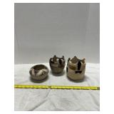 Three Clay Bowls with Painted Designs
