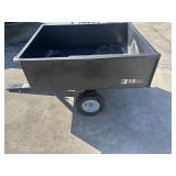 Wagon that hooks behind mower