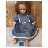 Joni 23' doll in blue dress