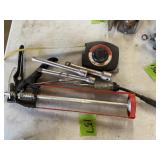 Caulk Gun And Socket Extensions