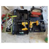 Two drills, wrenches and battery charger