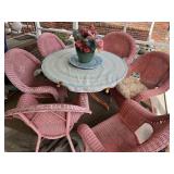 Wire table with six wicker chairs