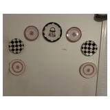 Plates on wall and bench