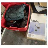 Tote of clothes and wire shelf