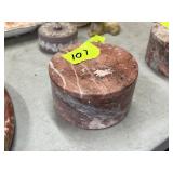 Circular stone weight