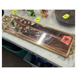 Large ornate gold-tone mirror