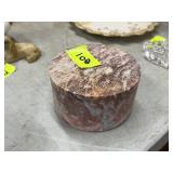 Circular stone weight