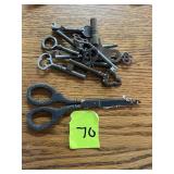Assorted keys and scissors