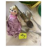 Spoons and doll
