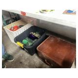 Luggage and contents under table