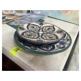 Two saucers and one hand-painted plate