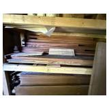 Wood on shelves in container