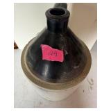 vintage brown jug with 2 on front
