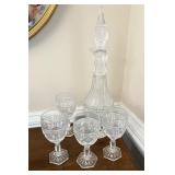 Decanter And Four Crystal Glasses