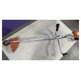 STIHL Weedwhacker with Handle Attachment