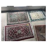 Four Small Rugs