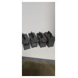Four plastic ammo boxes