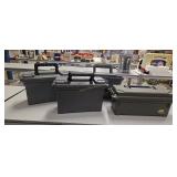 Four plastic ammo boxes