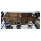 Three vintage railroad lanterns and two wooden