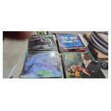 Vintage vinyl record albums and glassware