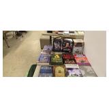 Books and DVDs as shown