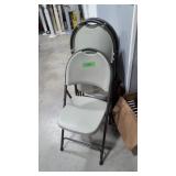 Three Plastic Folding Chairs