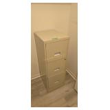 Three-drawer Metal File Cabinet Located In Hall